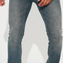 STACKED SKINNY FLARE JEAN WITH LETDOWN HEM